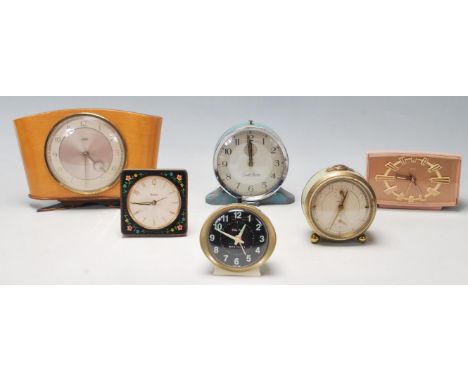 A good collection of vintage retro windup clocks / alarm clocks to include a Smiths Alarm clock with arabic numeral to the ch