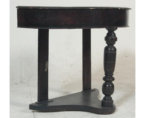 A Victorian 19th century mahogany demi-lune / half moon console hall table. Raised on bun feet with lower tier having front u