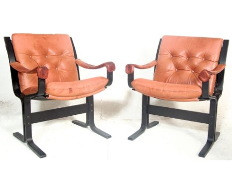 An amazing pair of retro vintage 20th century Danish inspired armchairs having black ebonies bentwood frame with red leather 