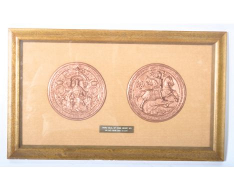 A retro vintage late 20th Century resin replica of the third seal of of King Henry the VIII. One side of the seal depicts Hen