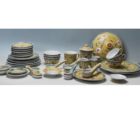 An extensive Chinese Republic period Famille Jaune imperial yellow tea and dinner service comprising of various cups, saucers