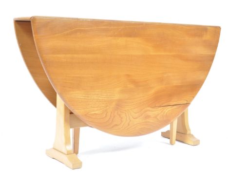 Lucian Ercolani - Ercol - Model 610 -&nbsp; A 20th century beech and elm wood Model 610 Windsor drop leaf / gate leg dining t