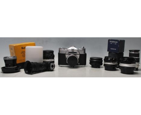 A vintage German Voigtländer camera along with spare lenses to include Nikkor S C auto 1:1.4 f=50mm No 1443112, Carl Zeiss Pr