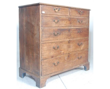 A George III 19th&nbsp;century oak 2 over 4 North Country chest of drawers. Raised on bracket feet with 2 short over 4 deep g