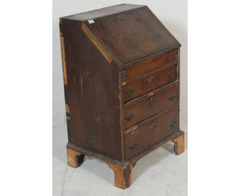 A 17th / 18th Queen Anne walnut&nbsp; ladies writing bureau in need of restoratoin. The period bureau of small proportions be