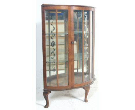 A retro vintage 1930s Art Deco walnut veneer mirror backed china display bookcase cabinet having a raised gallery back over s