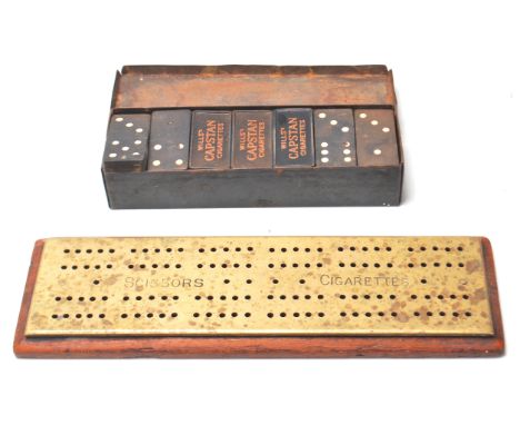 A set of vintage 1930's advertising tobacciana Will's Capstan dominoes, each having Wills to the backs set within a blue enam
