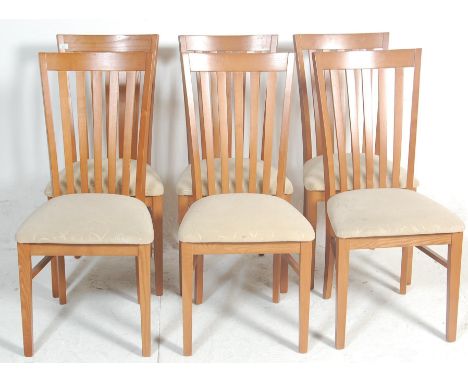 G plan - A set of 6 retro vintage late 20th Century dining chairs having a tapering comb shaped back rest over an upholstered