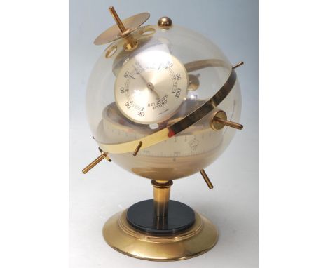 A vintage 20th century Huger Sputnik ES weather station, West German, incorporating a barometer, hygrometer and a&nbsp;thermo
