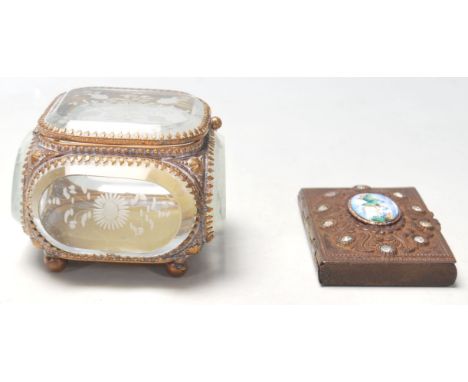 An antique Victorian glass jewellery ring box / Bijouterie box having an ormolu and gold frame with cut glass panels of flowe