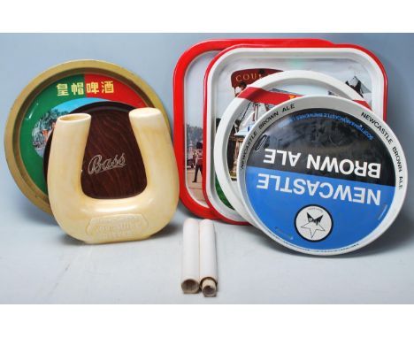 A group of vintage retro breweriana &amp; barware items to include metal serving trays for Newcastle Brown Ale, Vaux, Carlsbe