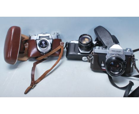 A group of three vintage 20th century 35mm cameras to include Pentax Asahi photograph camera with Super Takumar 1:2/55 No: 46
