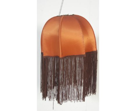 An original 1960's retro vintage BIBA lamp / lathing / lampshade. Wire framed construction with orange silk scalloped panels 
