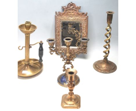 A good collection of early 20th century antique brass candlestick to include a Georgian example, single sconce candlestick wi