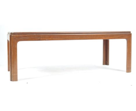 British Modern Design. A 20th century, circa 1970's teak wood and tile top long john coffee table. Raised on chamfered edge l