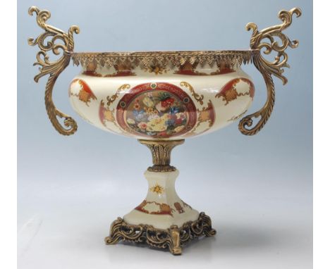 A 20th Century centrepiece / mantelpiece twin handled planter vase having an oval bowl being decorated with a central floral 