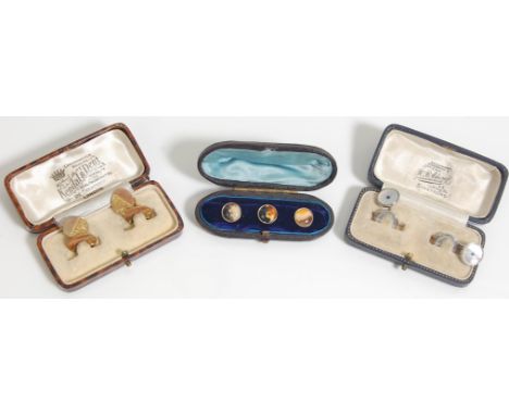 A group of three vintage gentleman's boxed cufflinks and studs to include a pair of silver mother of pearl and blue stone cuf