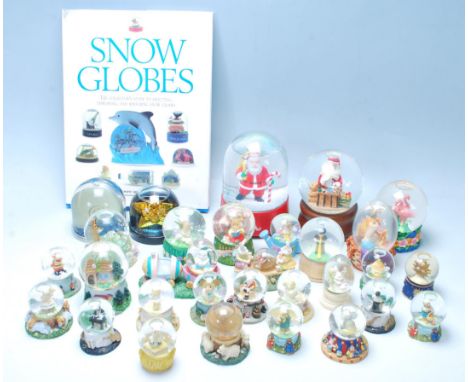 A large collection of 25+ original vintage collectable glass and plastic snow globes to include, The Leonardo Collection, Reg