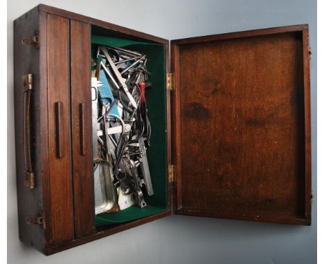 An early 20th century engineers field toolbox with drop down hinged front, two drawers to interior complete with the tools.