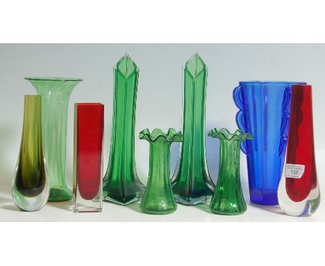 A collection of 20th century retro vintage studio art glass comprising of a pair of large green tapered vases, blue vases wit