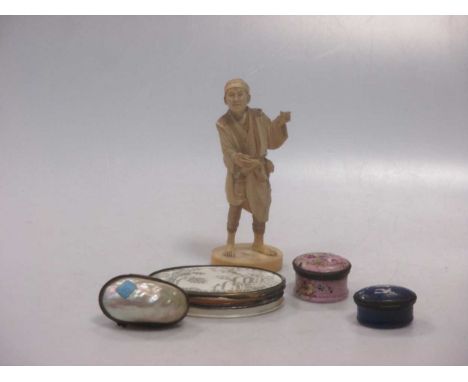 An 18th century ivory and white metal banded snuff box, together with two Bilston type snuff boxes and a Japanese ivory figur