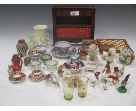 A collection of decorative ceramics and glasswares, to include miniature Derby cups and saucers, a Dresden miniature tea serv