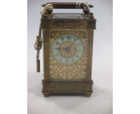 A Late Victorian carriage clock with a replacement escapement, a maker's name is not stated, 13.5cm high