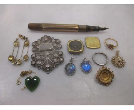 A collection of jewellery including a nurses buckle, a pair of butterfly wing ear pendants, a pair of stone set drop ear pend