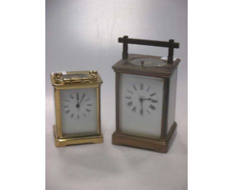 An Edwardian brass carriage clock, 13cm high and a mid 20th century carriage clock (2)Footnote: Provenance: Julians Park, Her