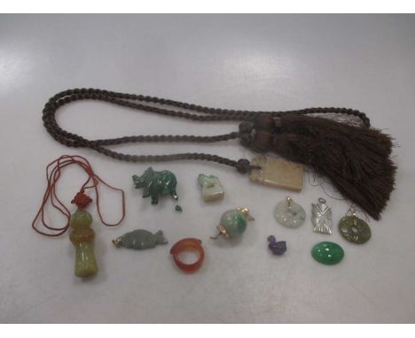 A collection of jade and other hardstone artefacts and jewels