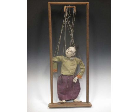 An early 20th century Japanese figure puppet within a wooden frameCondition report: Dimensions 95cm x 40cm