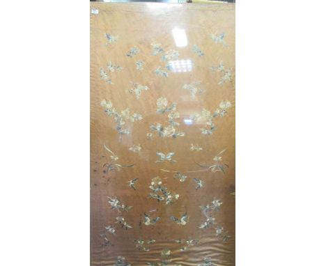 A coloured floral silk work embroided panel mounted on board 165 x 92cm