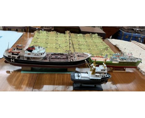 A model of ships trawler together with two others 