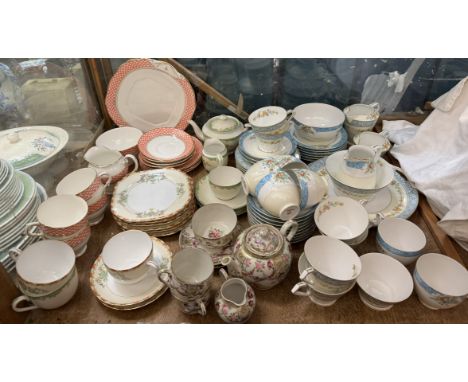 A Noritake part tea service decorated with flowers and leaves together with other Noritake part tea services and other tea se