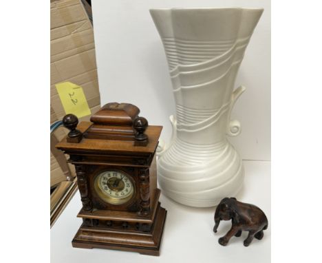 A large Sylvac pottery vase together with a mantle clock and an elephant figure