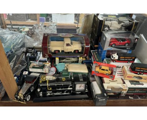 A collection of corgi Eddie Stobart lorries together with Burago models & other model vehicles