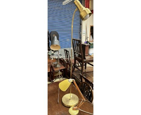 An angle poise lamp with yellow shade and base together with a chrome and black anglepoise lamp and an anglepoise standard la