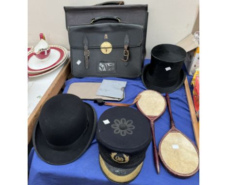 An RAF navigators briefcase together with an Elizabeth II Civil servants briefcase, GWR hat, top hat, bowler hat, Acme thunde