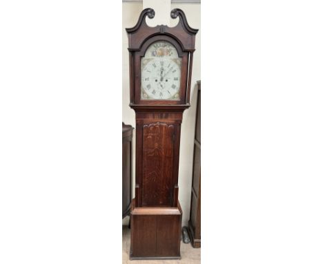 A 19th century oak and mahogany longcase clock, the hood with a broken swan neck pediment and fluted columns, above a long sh