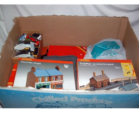 2 Trays containing a HORNBY R8083 TrakMat Accessories Pack, R274 Victrian Shops Kit (both Mint Boxed), various Triang Station