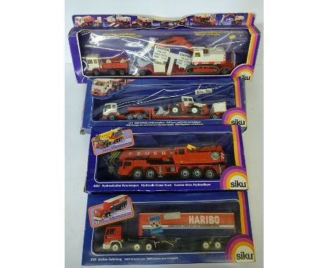 Four Siku (W.Germany) commercial die-cast models: 4012 Lorry with Trailer and Excavator; 4010 Hydraulic Crane Truck 'Feuerweh
