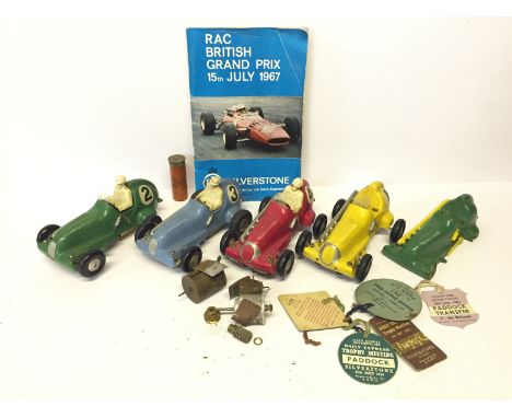 Four modified Marx Toys racing cars, each with the body of a Marx plastic car with a motor attached, similar to the early slo