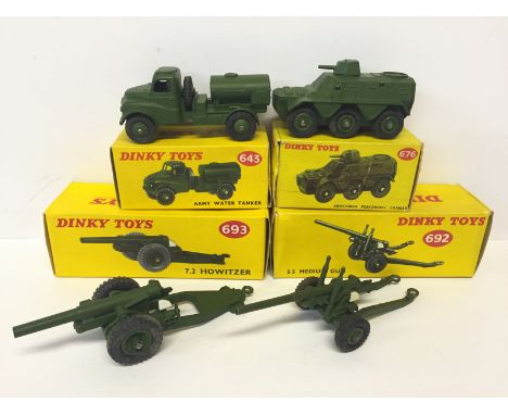 Four Dinky Toys military models: 643 Army Water Tanker; 676 Armoured Personnel Carrier (in G box); 693 7.2 Howitzer; 692 5.5 