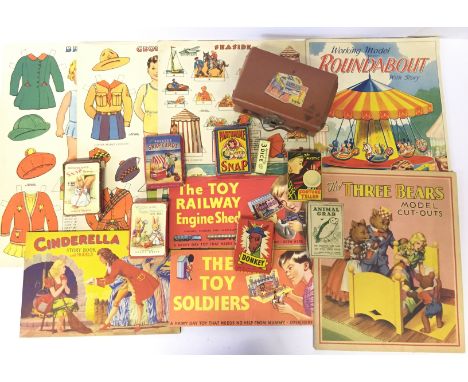 Seven card games including The Mystic Fortune Teller and Gibson & Sons Animal Grab contained in a miniature suitcase (F-G box