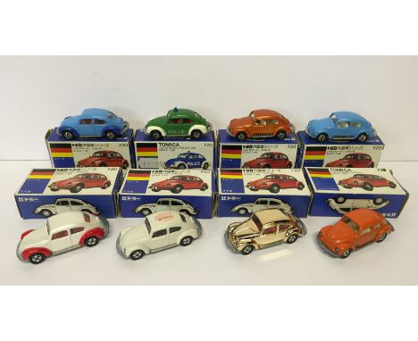 Eight Tomica Volkswagen Beetle models, 1/60 scale: 7 x F20 in various colours including pearlescent white with red wheel arch