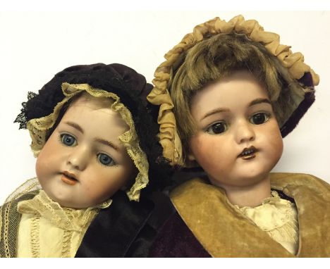 Late 19th/early 20th Century pair of Simon Halbig (Germany) bisque head dolls, one with sleeping blue eyes and the other with