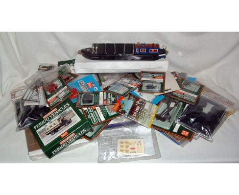 A Box containing a large number of 00 Station Accessory, Building, Vehicle and other Scenic Packs by PECO, MODEL SCENE, WILLS