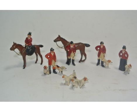 A vintage lead toy hunting group, two equestrian figures, three further figures and one group of hounds (6) (displayed in cab