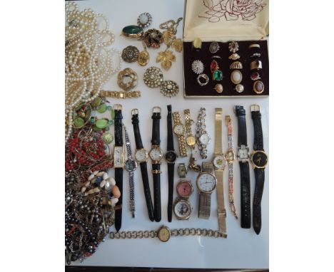 A collection of eleven various imitation pearl necklaces; sixteen various wristwatches; miscellaneous costume jewellery, incl