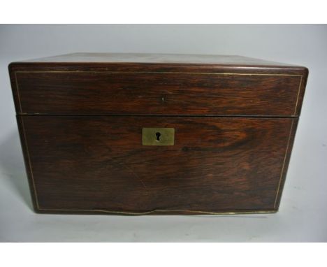 A 19th century rosewood veneered sewing slopes with rectangular brass inlay to lock escutcheon, further brass banded inlaid b